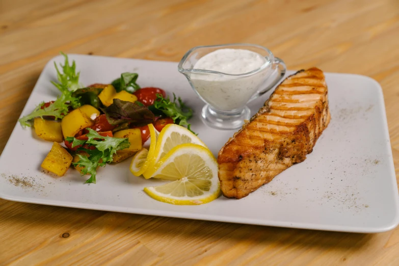 a close up of a plate of food on a table, fish tail, square, thumbnail, full body image