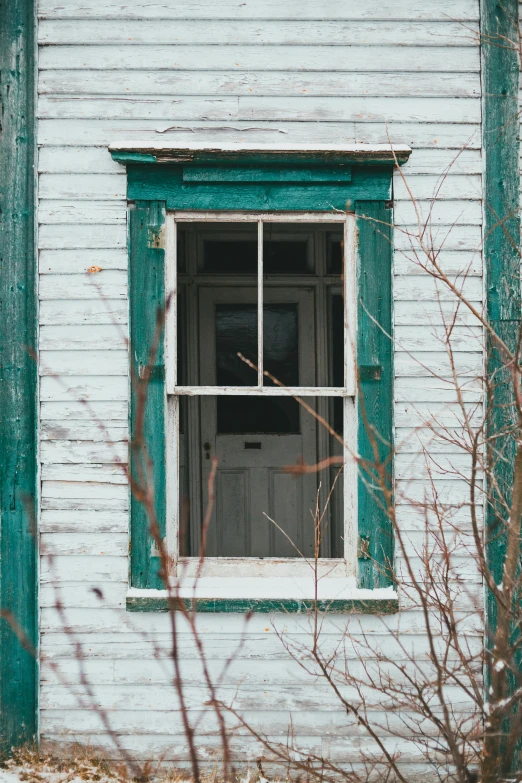 a red fire hydrant sitting in front of a white house, an album cover, inspired by Elsa Bleda, unsplash, tattered green dress, old cabin, photo of a beautiful window, teal aesthetic