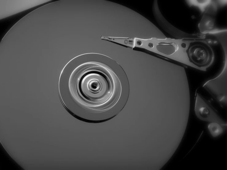 a black and white photo of a hard drive, a computer rendering, by Jan Kupecký, computer art, uploaded, close shot, tools, filmstill