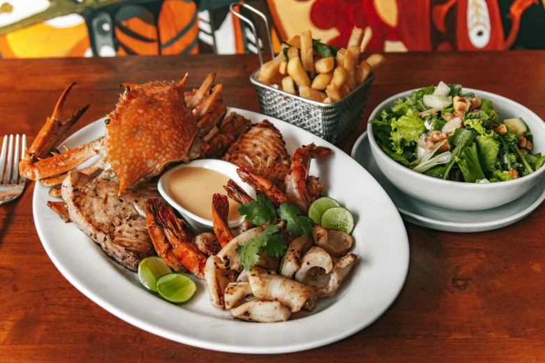 a close up of a plate of food on a table, tropical sea creatures, four arms, daily specials, thumbnail