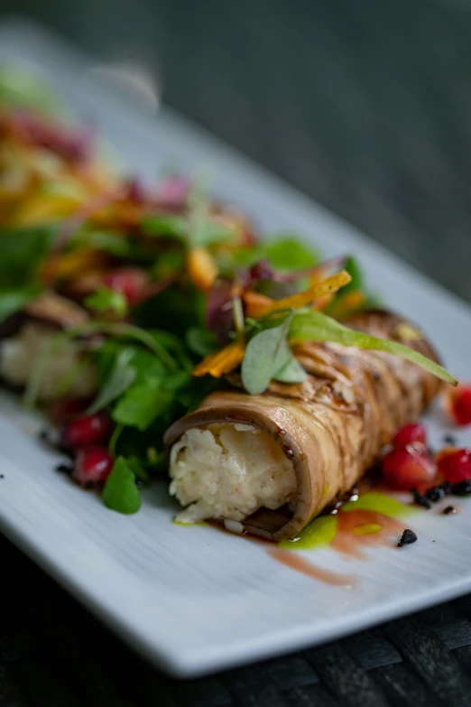 a close up of a plate of food on a table, sandworm, caparisons, profile image, dessert