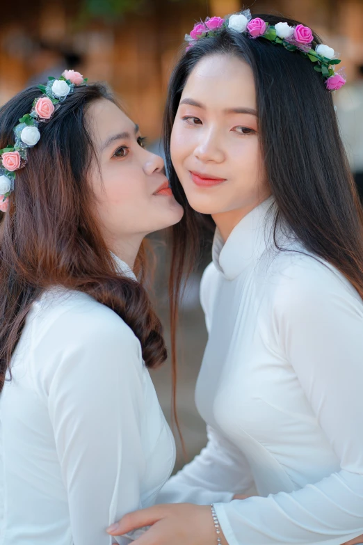 a couple of women standing next to each other, a picture, by Tan Ting-pho, unsplash, pale milky white porcelain skin, 8 k ), square, vietnamese woman