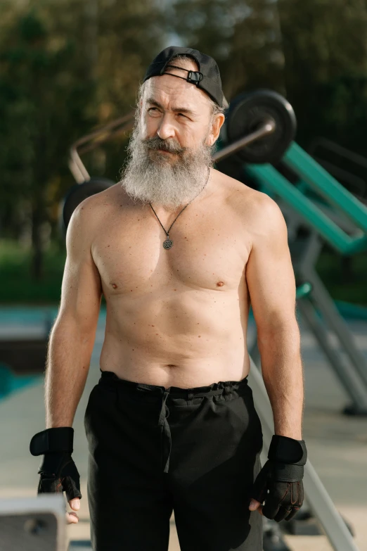 a man with a beard standing next to a skateboard, by Serhii Vasylkivsky, happening, musculated, 5 5 yo, belly button showing, greybeard