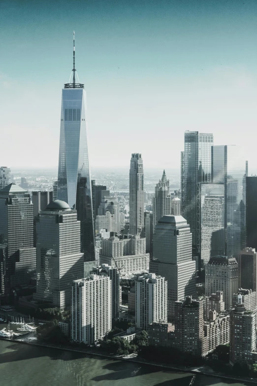 an aerial view of a city with skyscrapers, pexels contest winner, modernism, world trade center twin towers, 4 k cinematic panoramic view, high resolution image, multiple stories