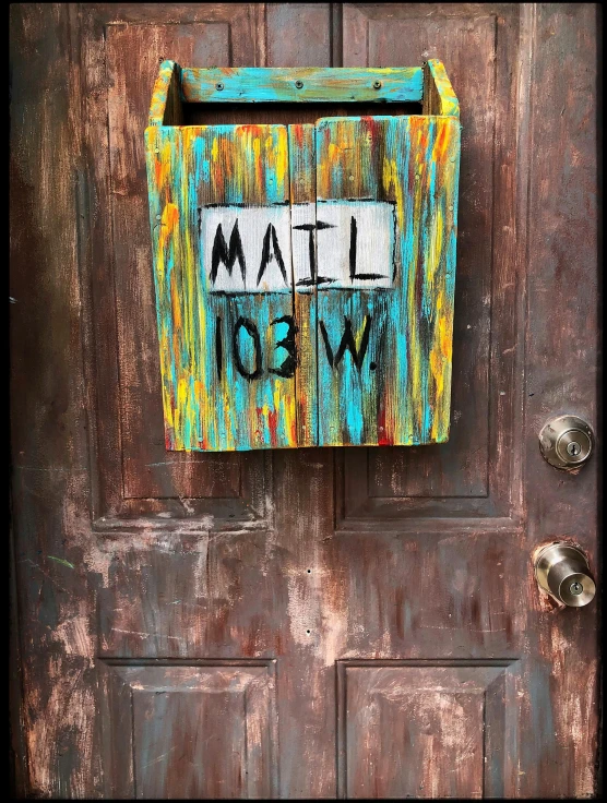 a close up of a mail box on a door, an album cover, by Kristin Nelson, unsplash, mail art, !!!esao andrews!!!, 2 0 2 0 award winning painting, rustic, miscellaneous objects