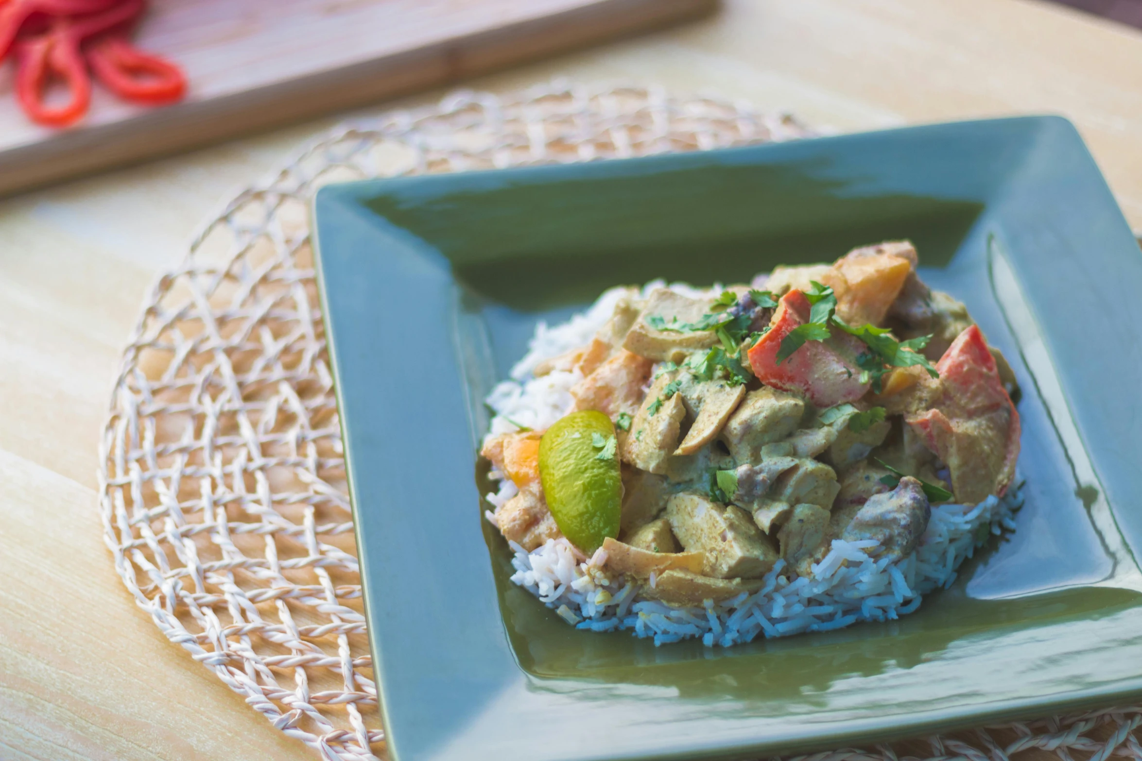 a close up of a plate of food on a table, inspired by John Steuart Curry, unsplash, dau-al-set, square, avocado, laos, green