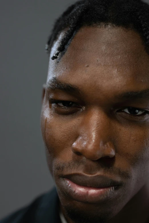 a close up of a person wearing a tie, a character portrait, trending on unsplash, photorealism, ( ( dark skin ) ), portrait of apex legends, julian ope, 2 3 years old