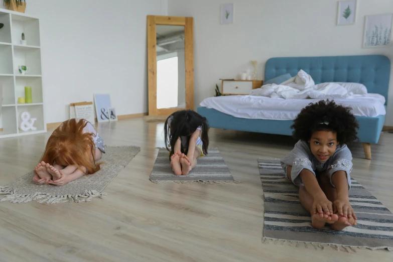 a couple of kids sitting on top of a wooden floor, in a room, pixeled stretching, profile image, girls resting