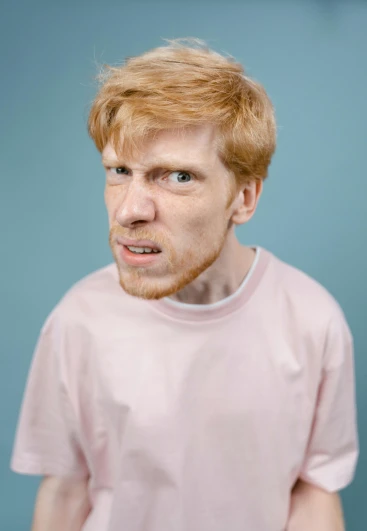 a man with a surprised look on his face, an album cover, trending on pexels, realism, ginger hair, angry look, pink face, john carmack
