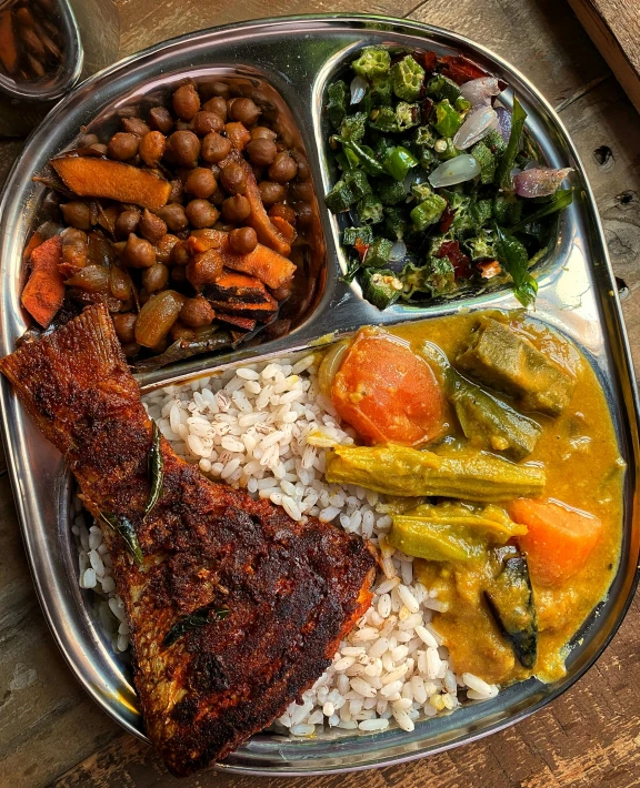 a metal tray filled with different types of food, a photo, by Sam Dillemans, dau-al-set, profile image, sri lanka, instagram post, 10k