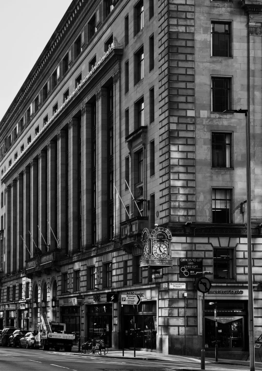 a black and white photo of a city street, a black and white photo, inspired by Alfred Eisenstaedt, berlin secession, detailed no. 1 0 downing street, glasgow, symmetry!!!, square lines