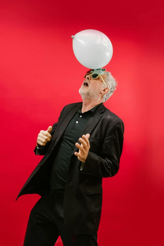 a man with a balloon on his head, an album cover, by Jodorowsky, unsplash, a silver haired mad, in an action pose, white beard, chihuly