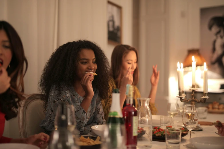 a group of women sitting at a dinner table, profile image, cinematic image, tv commercial, high quality image