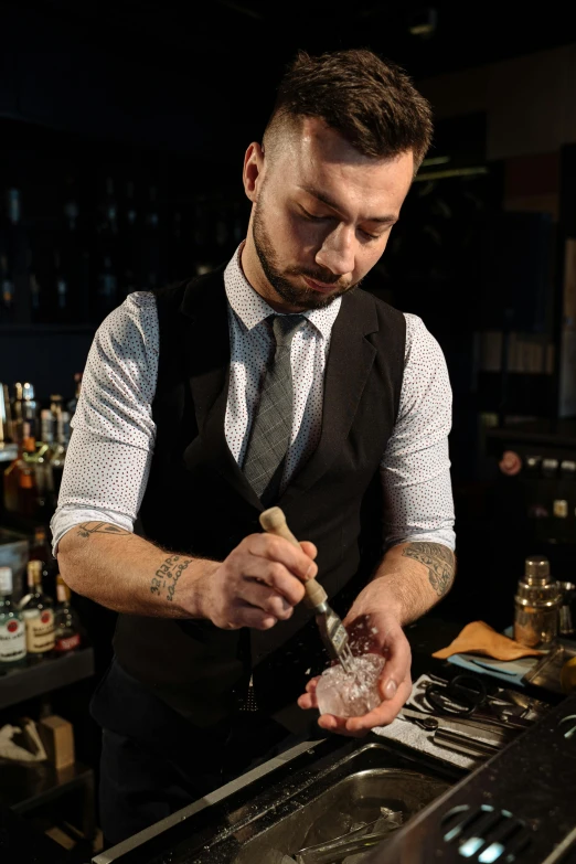 a man that is standing in front of a bar, pouring techniques, profile image, thumbnail, adrian borda