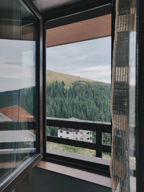 a bedroom with a view of the mountains, by Emma Andijewska, unsplash contest winner, visual art, balcony door, pine forest, carpathian mountains, opposite the lift-shaft