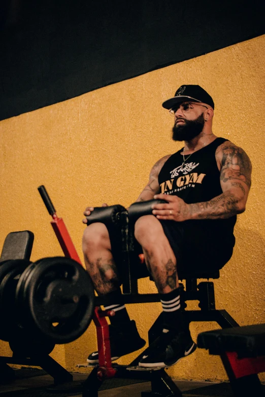 a man sitting on a bench with a barbell, by Brian 'Chippy' Dugan, sitting on golden throne, zachary corzine, profile image