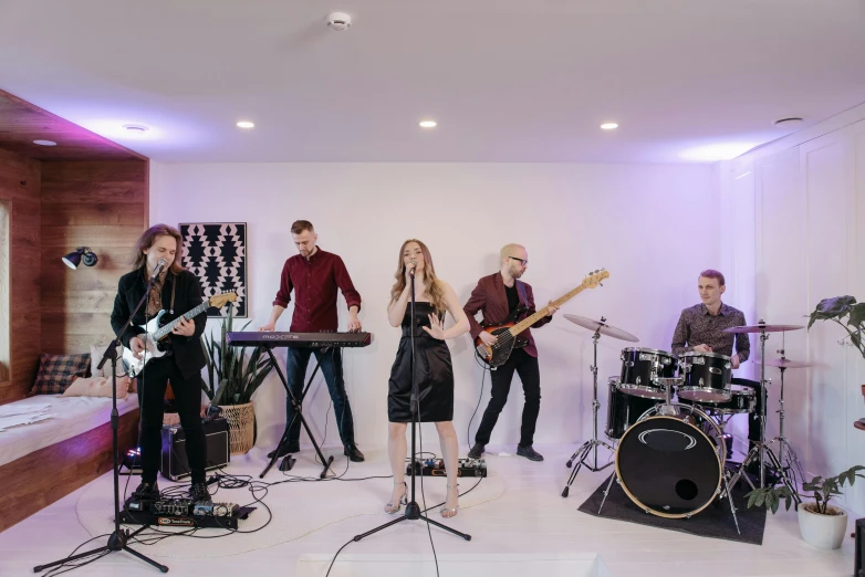 a group of people that are standing in a room, band playing, profile image, on a white table, dasha taran