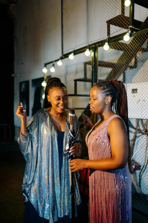 two women standing next to each other holding wine glasses, by Ella Guru, happening, dark skinned, [ theatrical ], rooftop party, profile image