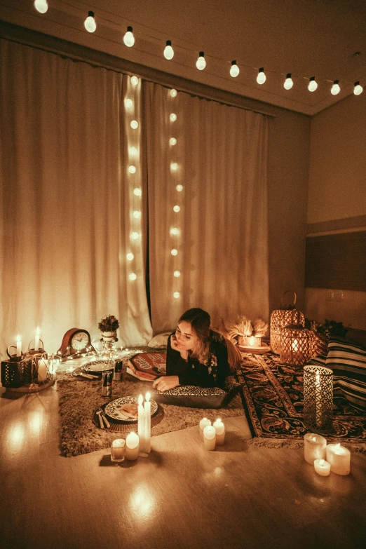 a woman laying on the floor surrounded by candles, inspired by Elsa Bleda, family dinner, islamic, in a room, middle eastern style vendors