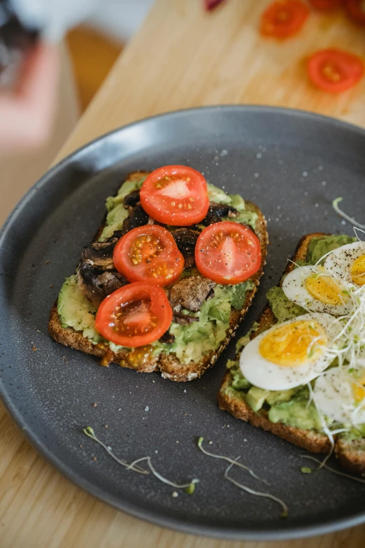 a close up of a plate of food on a table, toast, avocados, trending on e 6 2 1, grey