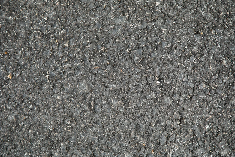 a red fire hydrant sitting on the side of a road, an album cover, by Howardena Pindell, bauhaus, high resolution coal texture, dark grey, detailed scales, strong eggshell texture