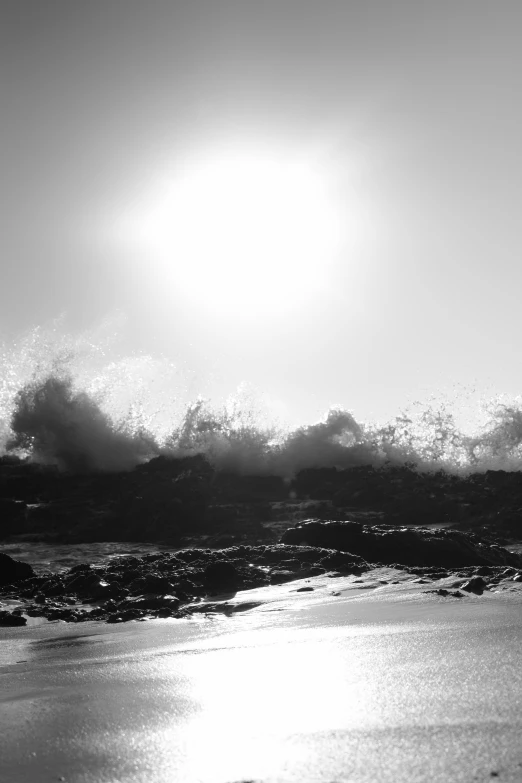 a black and white photo of a person holding a surfboard, toward the sun rays and caustics, apocalyptic tumultuous sea, erosion, ( ( ( kauai ) ) )