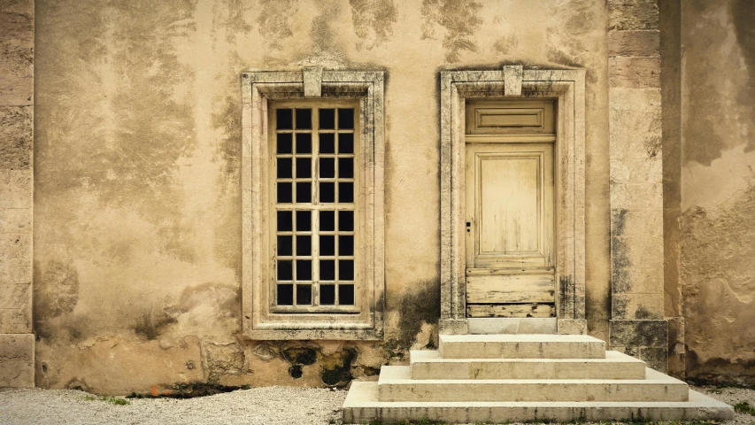 a couple of windows sitting on the side of a building, an album cover, inspired by Camille Corot, pexels contest winner, neoclassicism, wood door, old stone steps, yellowed with age, calotype