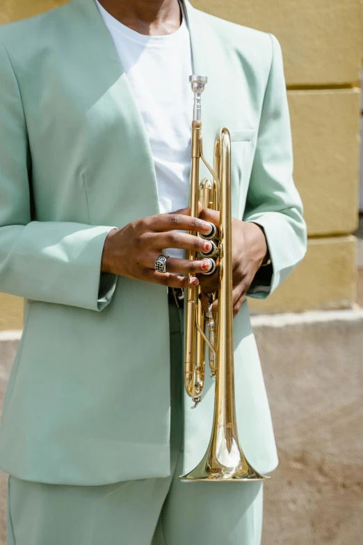 a man in a green suit holding a trumpet, by Winona Nelson, trending on unsplash, photo of a woman, wearing a light blue suit, 15081959 21121991 01012000 4k, extra detail