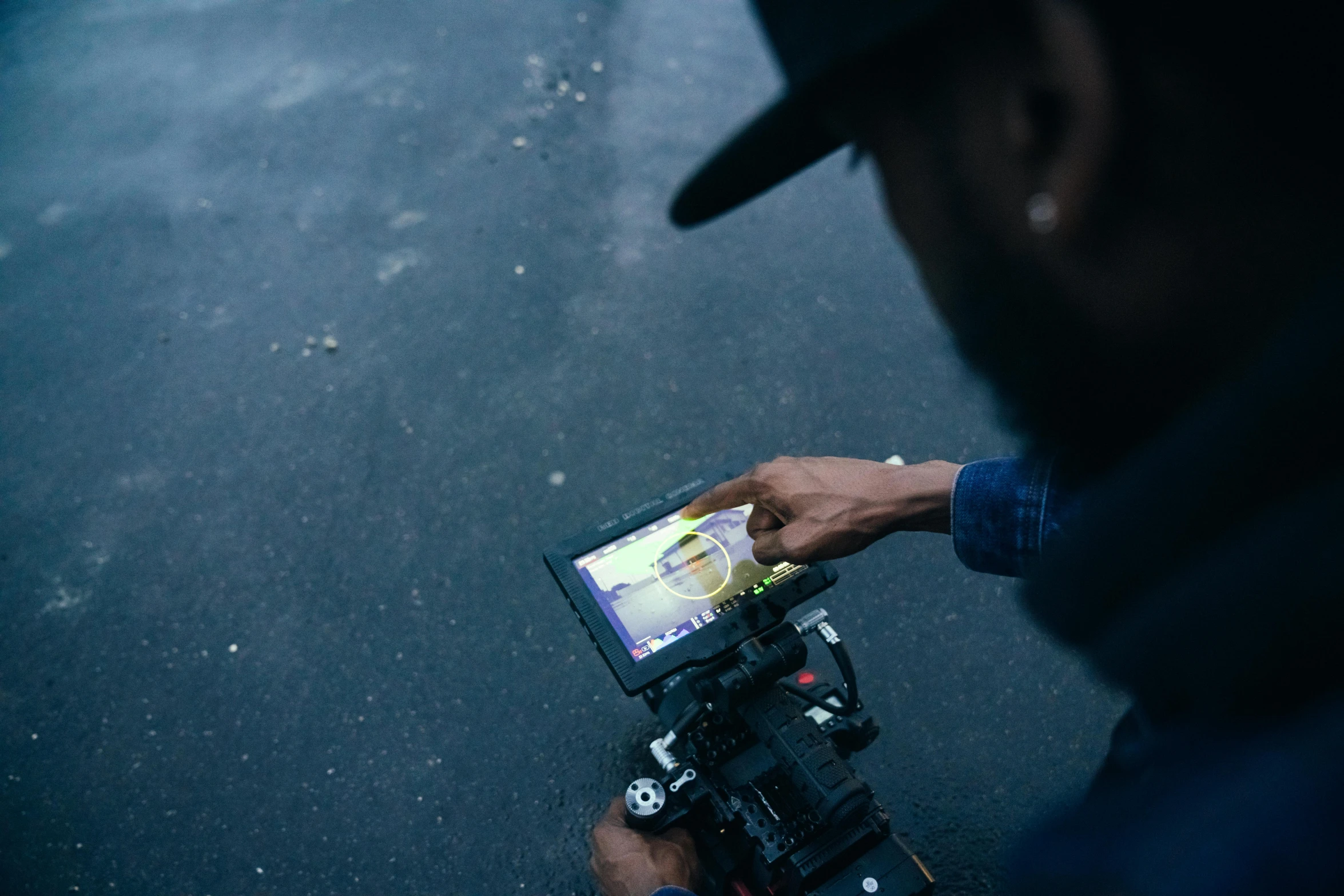 a close up of a person holding a camera, a picture, action scene, mkbhd, movie set”, digital artwork