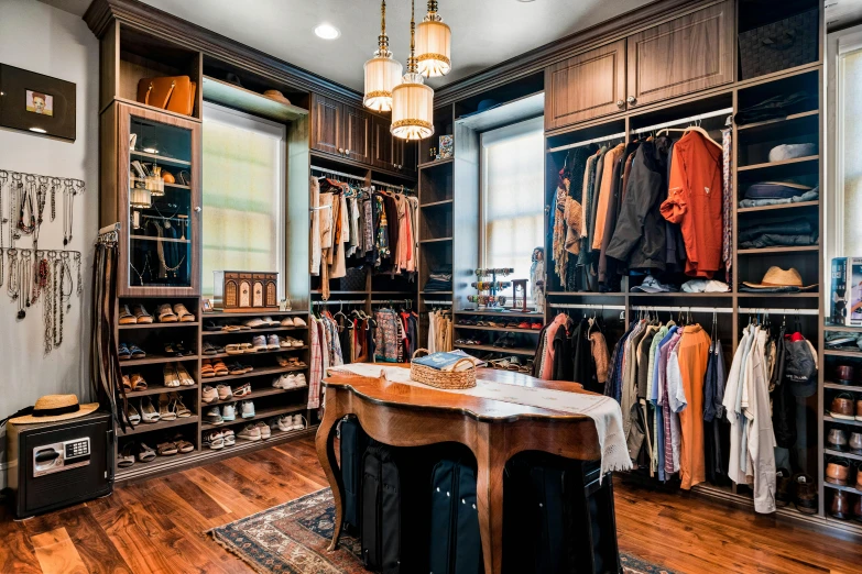 a walk in closet filled with lots of clothes, by Julia Pishtar, real estate photography, colonial style, masculine appeal high fashion, theater dressing room
