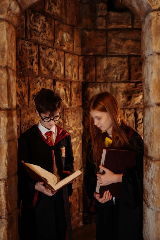 a couple of people standing next to each other, wizard reading a directory, inside a castle, magical school student uniform, photograph taken in 2 0 2 0