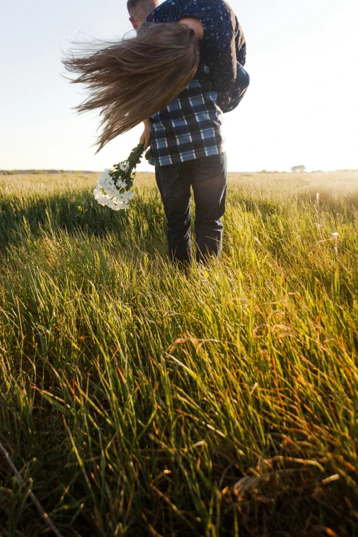 a man carrying a woman in a field, by Jesper Knudsen, trending on unsplash, wind in long hair, carrying flowers, denim, 15081959 21121991 01012000 4k