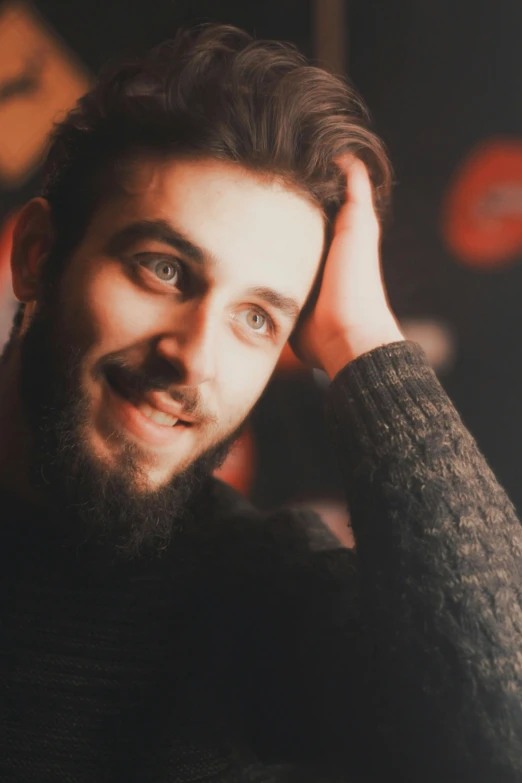 a close up of a person with a beard, a picture, inspired by Adam Dario Keel, hurufiyya, discord profile picture, beautiful and smiling, raphaël, gif