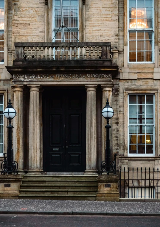 a red fire hydrant sitting in front of a building, by Tom Scott RSA, renaissance, symmetrical doorway, thumbnail, top, edinburgh