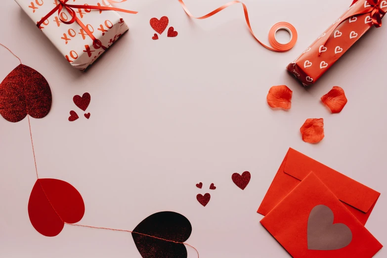 a white table topped with lots of valentine's day decorations, a cartoon, by Carey Morris, pexels contest winner, orange ribbons, desktop wallpaper, red, lipstick