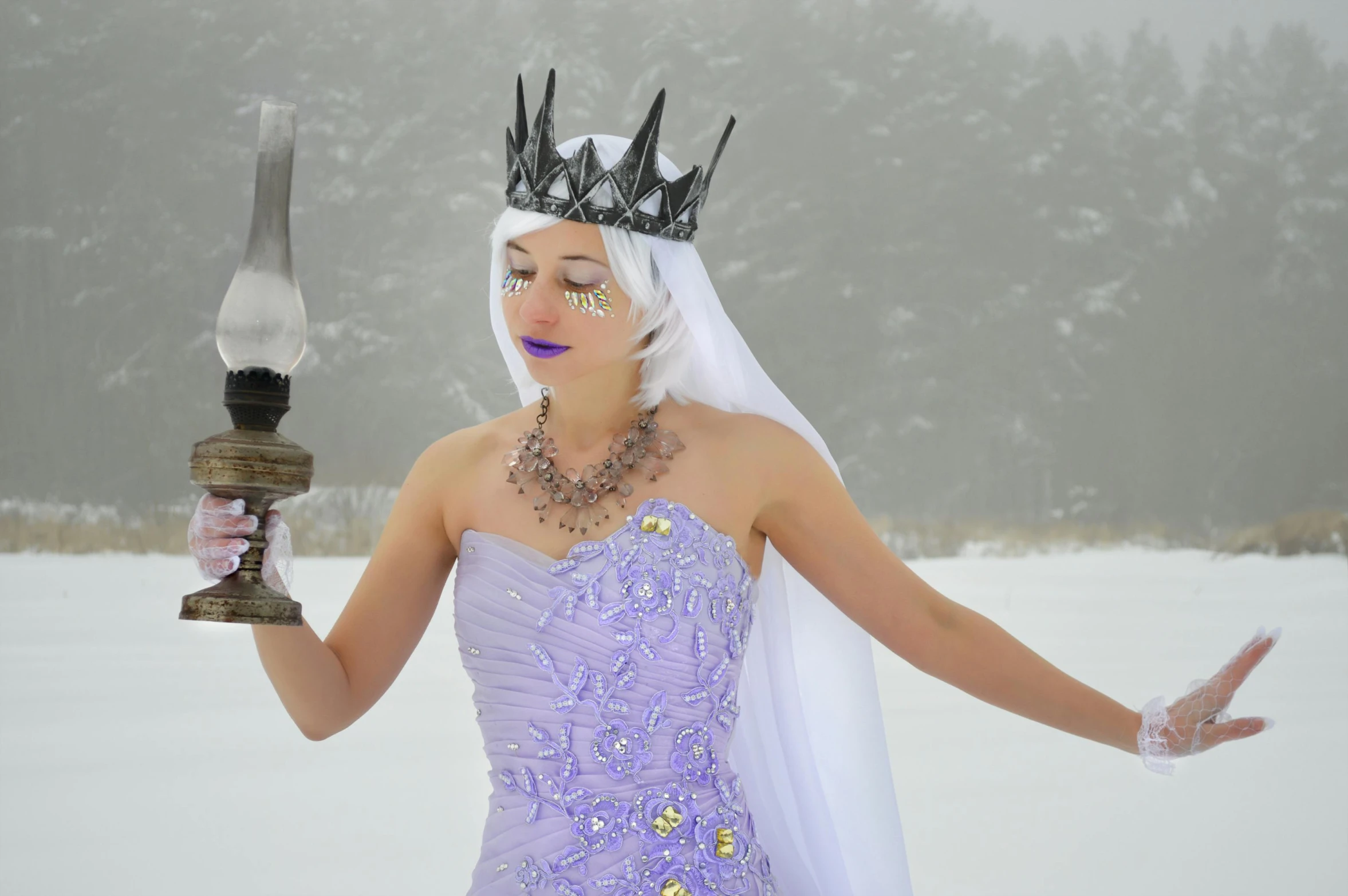 a woman in a purple dress holding a lamp, a photo, inspired by karlkka, pexels contest winner, fantasy art, wears a light grey crown, only snow in the background, posing in leotard and tiara, cosplayer