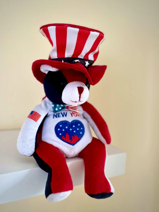 a red, white and blue teddy bear wearing a top hat, 3 d precious moments plush cat, in new york city, upset, contest winner 2021