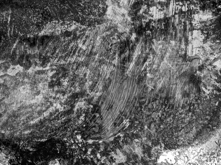 a black and white photo of a rock, an abstract drawing, inspired by Hans Hartung, lyrical abstraction, satellite view, high resolution coal texture, wood texture overlays, clouds on surface