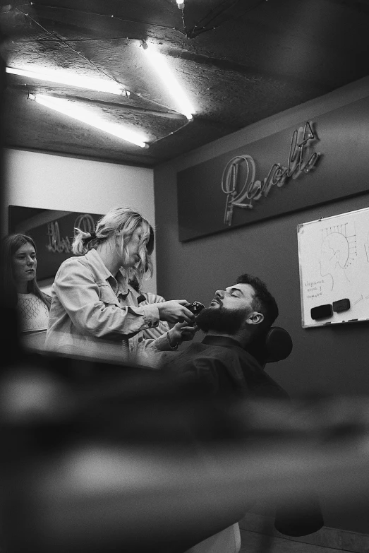 a black and white photo of a man getting his hair cut, a black and white photo, by Matt Cavotta, reddit, jen bartel, mac miller, brushes her teeth, rhys lee