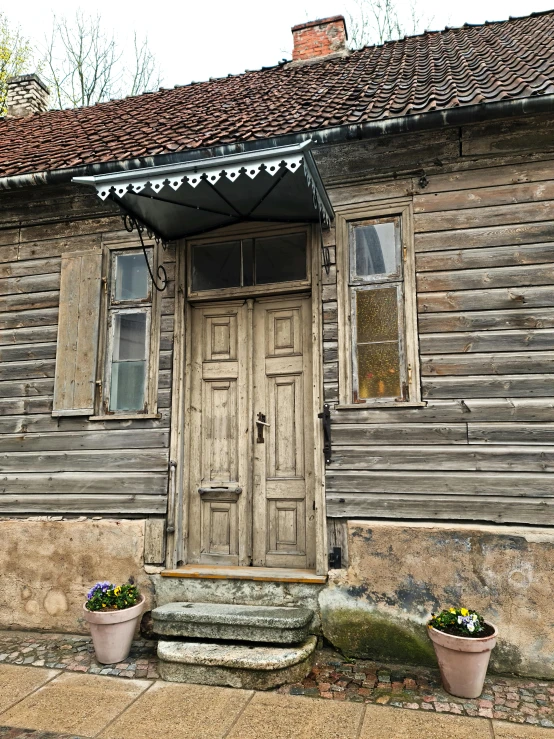 an old wooden house sitting on the side of a road, inspired by Edo Murtić, renaissance, doors to various bedrooms, how pretty, cottagecore, slide show