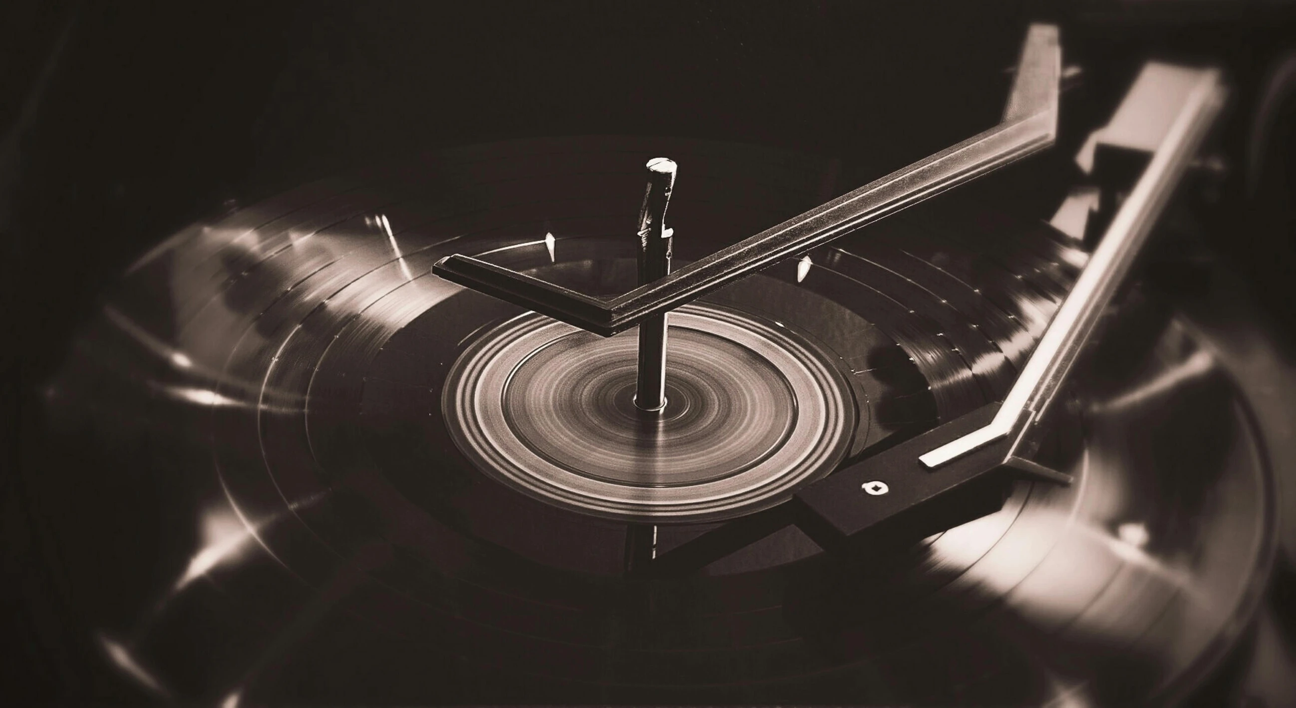 a black and white photo of a record clock, an album cover, turntablism dj scratching, sepia tones, 1980s photograph, hd artwork