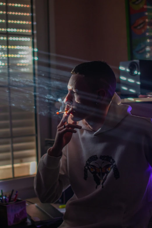 a man smoking a cigarette in a dark room, inspired by Elsa Bleda, pexels contest winner, hyperrealism, yung lean, in a spaceship, teddy fresh, weed