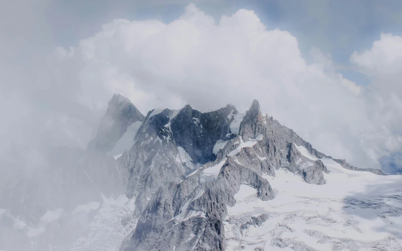 a group of people standing on top of a snow covered mountain, an album cover, inspired by jessica rossier, pexels contest winner, grey cloudy skies, carrara marble, vertical wallpaper, real engine 5 cinematic