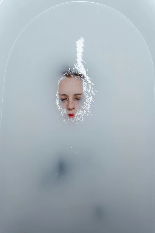 a close up of a person in a bath tub, inspired by Gottfried Helnwein, renaissance, cryogenic pods, julia hetta, face fully visible, photographed for reuters