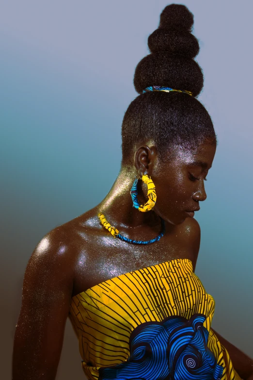 a woman in a yellow and blue dress using a cell phone, inspired by Makoto Aida, trending on pexels, afrofuturism, with small studded earings, yoruba body paint, bare shoulders, promotional image