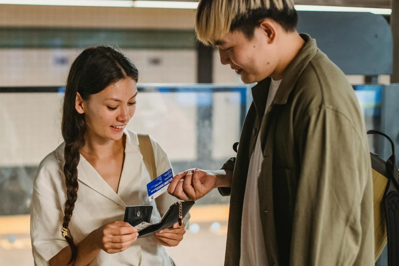 a man and a woman standing next to each other, pexels contest winner, service ticket close up, people shopping, avatar image, taejune kim