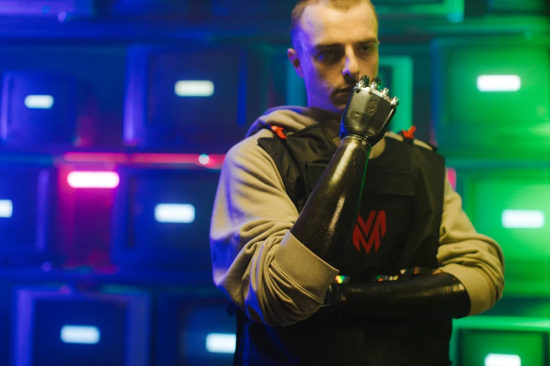 a man that is holding a gun in his hand, cyberpunk art, inspired by Adam Marczyński, pexels, neo-dada, prosthetic arm, unreal engine : : rave makeup, mac miller, death + robots series of netflix