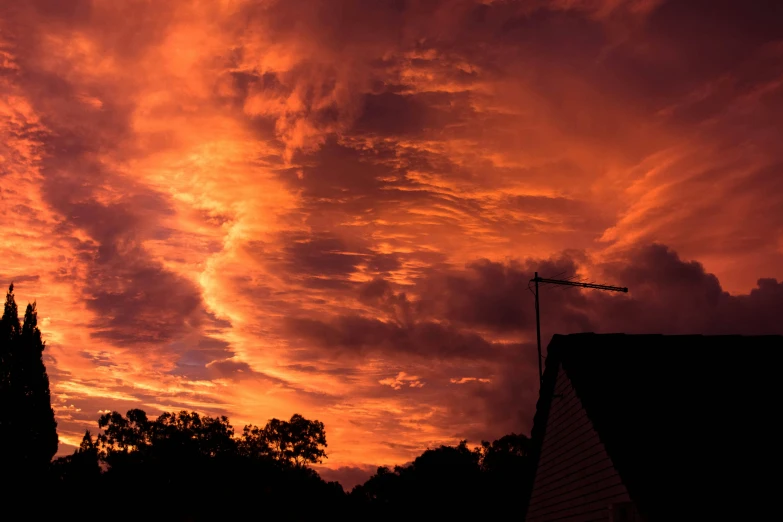 the sky is red and orange as the sun sets, by Robert Storm Petersen, pexels contest winner, interstellar stormy bright sky, # nofilter, fire storm, late summer evening