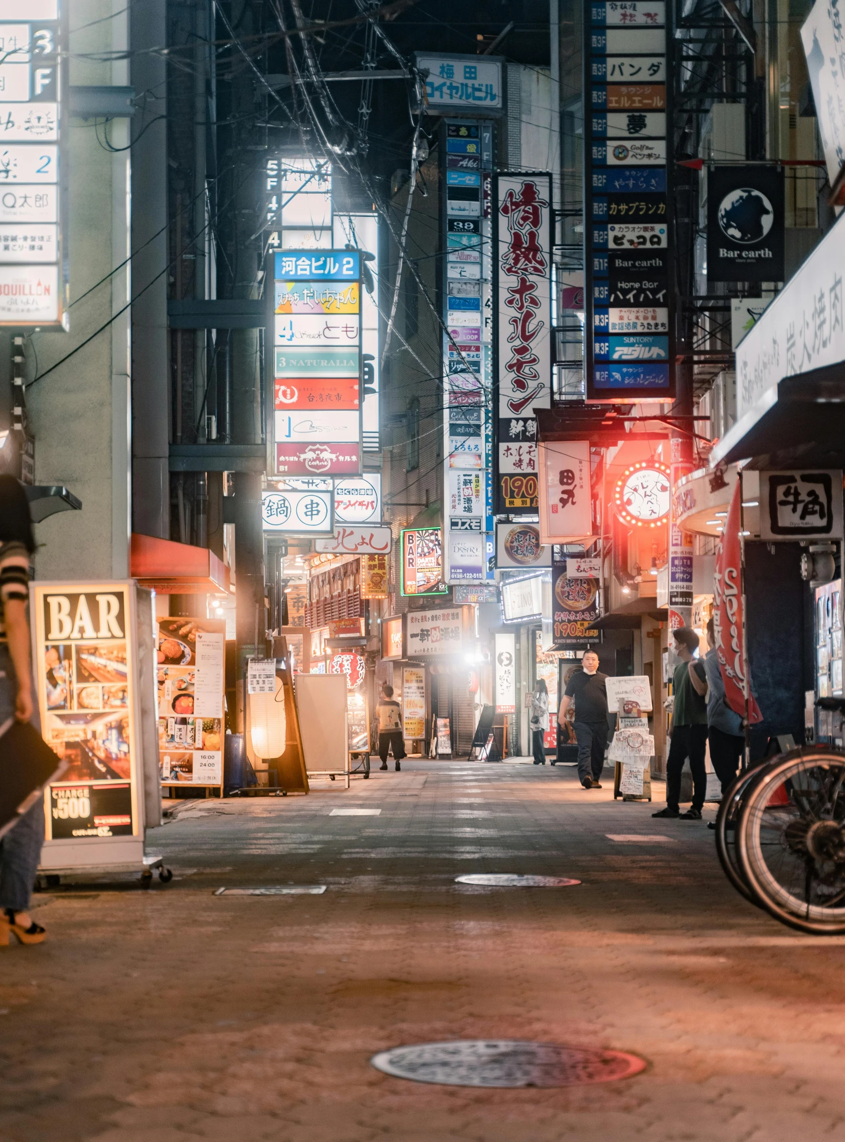 a man riding a bike down a street at night, a picture, unsplash contest winner, ukiyo-e, lots of signs and shops, dusty abandoned shinjuku, 🚿🗝📝, travelers walking the streets