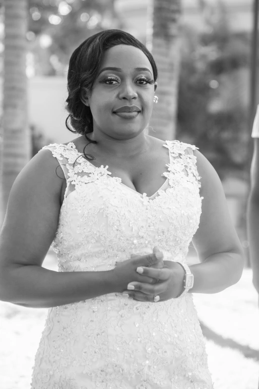 a black and white photo of a woman in a wedding dress, a black and white photo, george pemba, uploaded, black & white photo, - n 9